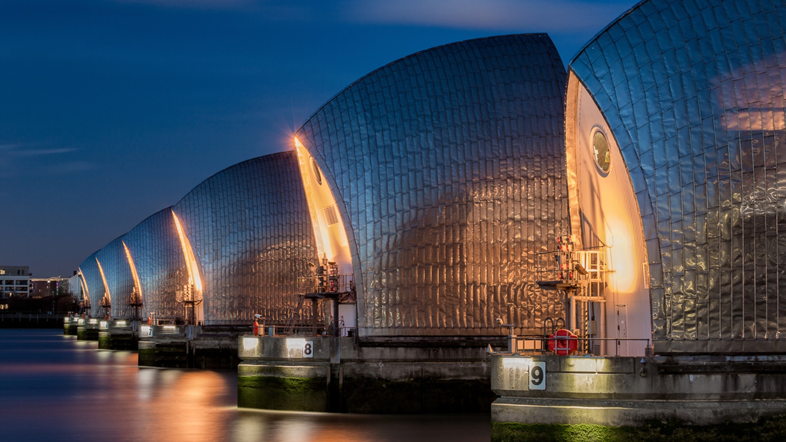 Thames Flood Barriers in profile at night, East London